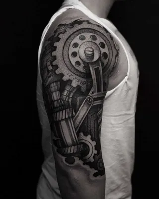 Изображение татуировки Биомеханика на руке в формате WebP