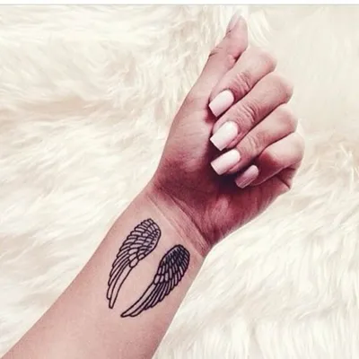 Крылья на руках: прекрасные изображения татуировок