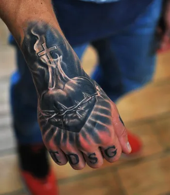 Фотографии татуировок на кисти рук мужчин: стильные решения