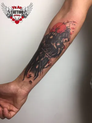 Фото тату на руке в стиле традиционного татуирования