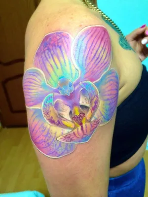 Фотка тату орхидея на руке: изысканный дизайн для модных девушек