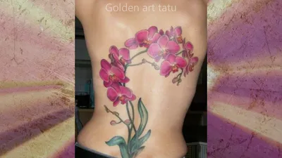 Фото тату орхидея на руке: яркий акцент на стильной руке