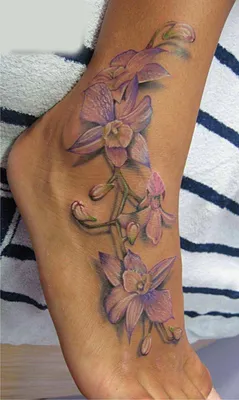 Тату орхидея на руке: фото с высокой детализацией для использования в дизайне