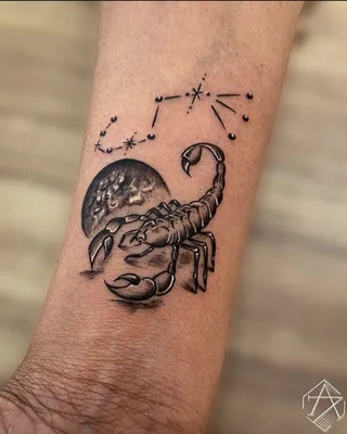 Изображение тату скорпиона на руке для тату-студии