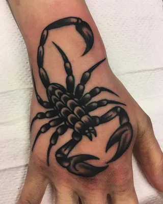Изображение тату скорпион на руке: мощное и выразительное
