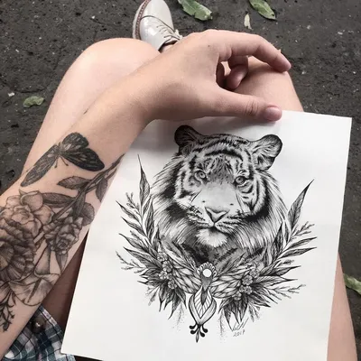 Изображение тату тигра на руке в высоком разрешении