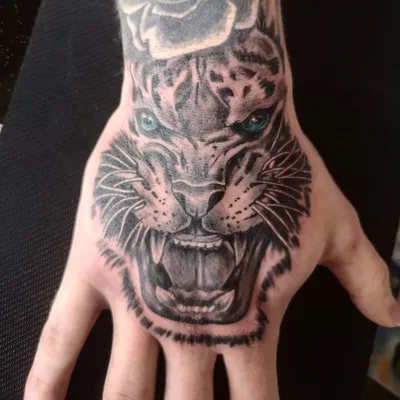 Фотография тату тигра на руке для тату-мастеров