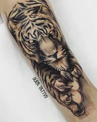 Картинка тату тигра на руке в нео-традиционном стиле