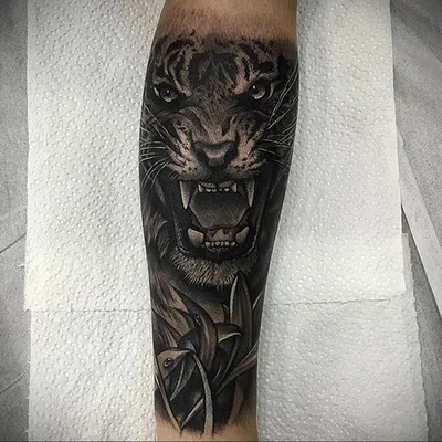 Картинка тату тигра на руке: символ силы и мощи
