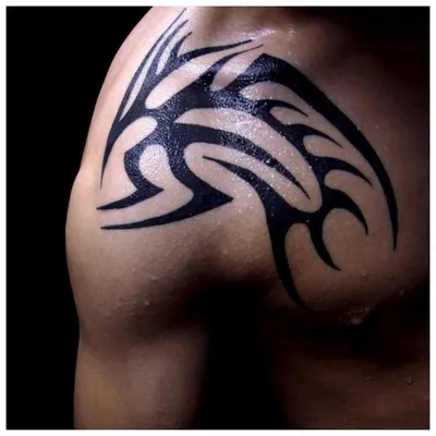 Изображение татуировки трайбл на руке в формате WebP для быстрой загрузки на сайте