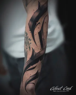 Изображение татуировки трайбл на руке в формате WebP