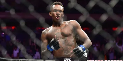Исраэль Адесанья в UFC: коллекция лучших фото | Исраэль Адесанья Фото  №33019 скачать