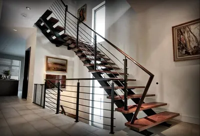 Выбираем лестницу для дома: дерево, бетон или металл?